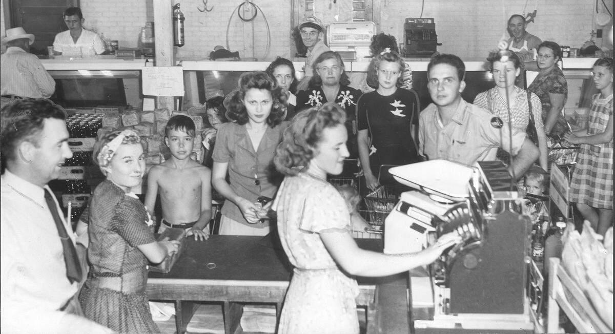 Sept. 4, 1945: Manager J.H. Patton looks on as a clerk rings up an order at the Hill and Mack Grocery store in the Liberator Village shopping center of Fort Worth. (The World War II era housing complex and shopping center was just south of today’s Lockheed Martin complex in White Settlement.)