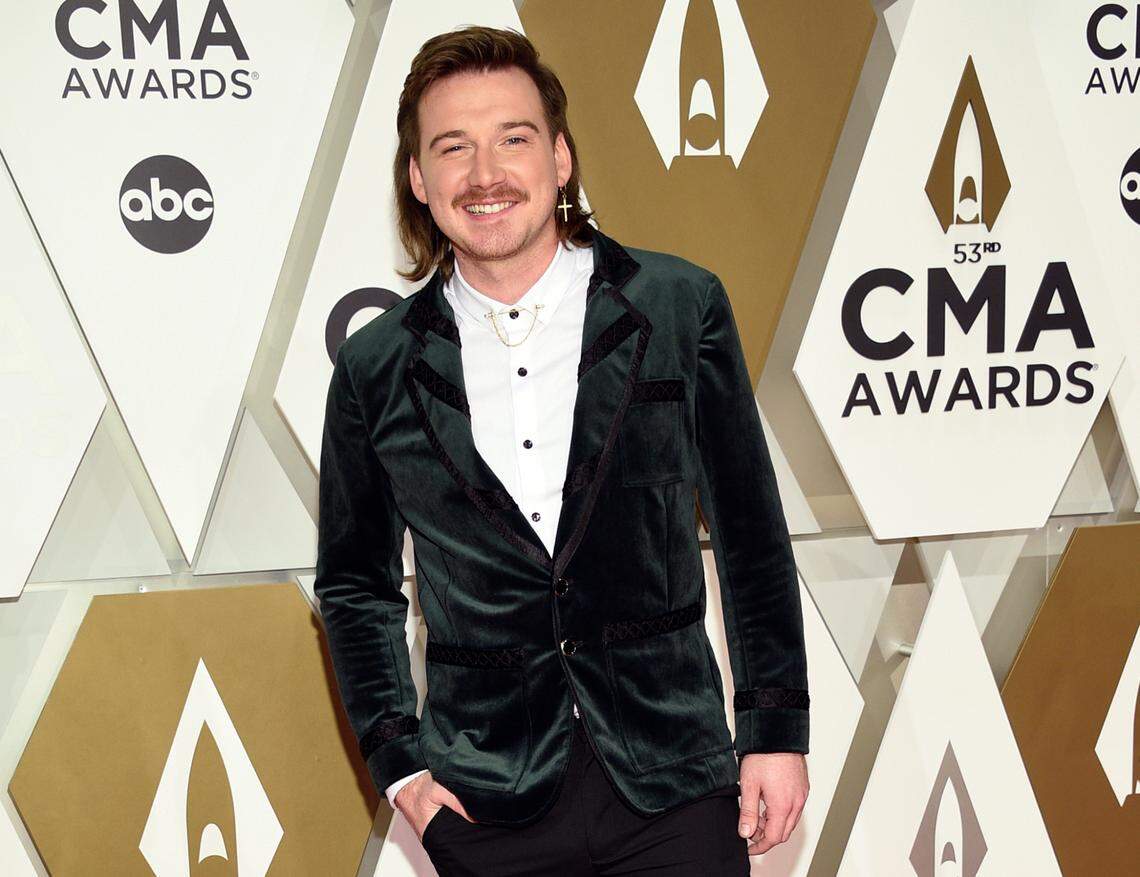 FILE - Morgan Wallen arrives at the 53rd annual CMA Awards on Nov. 13, 2019, in Nashville, Tenn. Wallen said it was ignorant of him to use a racial slur. In his first interview in six months, Wallen talked to Michael Strahan on ABC’s “Good Morning America.” on Friday, July 23, 2021. (Photo by Evan Agostini/Invision/AP, File)