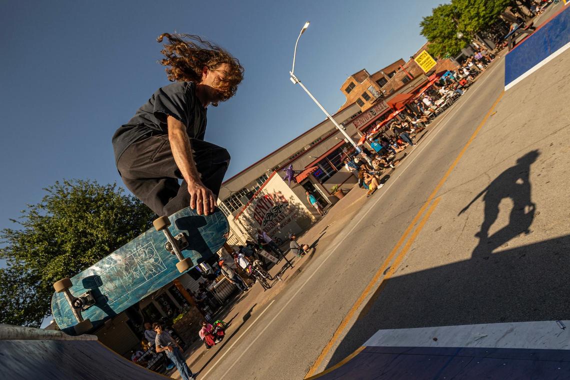 Adam Moen performs a skate trick on a ramp in the skate jam area of Open Streets on Magnolia Avenue in Fort Worth on Saturday.