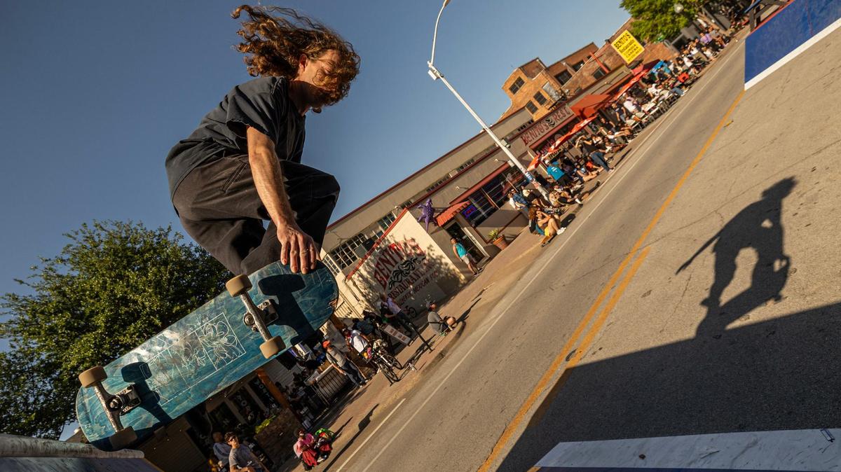 Adam Moen performs a skate trick on a ramp in the skate jam area of Open Streets on Magnolia Avenue in Fort Worth on Saturday, April 13, 2024. Open Streets is a national movement encouraging innovative ways to achieve environmental, social, economic, and public health goals by temporarily closing streets to automobile traffic, so that people may use them for walking, bicycling, dancing, playing, and socializing.