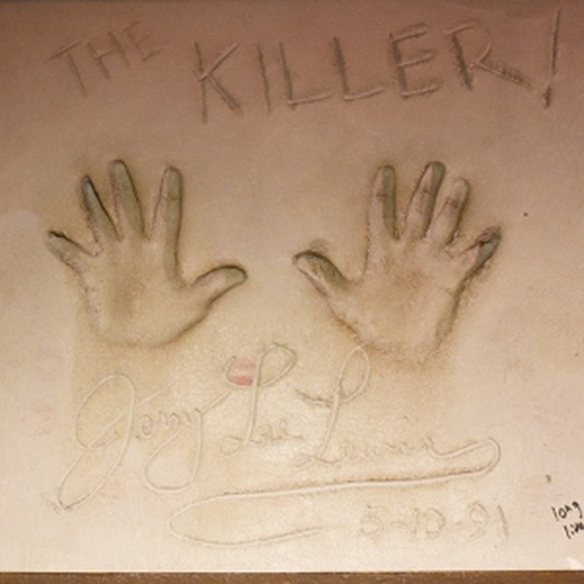 Jerry Lee Lewis had his handprint’s cemented at Billy Bob’s Texas on May 10, 1991.