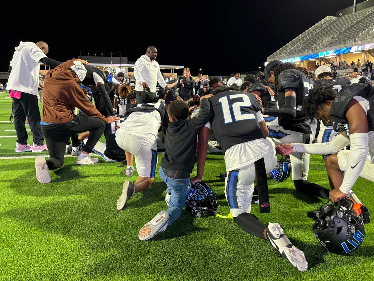 North Crowley quarterback Chris Jimerson Jr. kneeling in the huddlle after a 62-6 victory over Weatherford on Friday, Oct. 18, 2024. He threw five touchdown passes and tallied over 250 of total yards in three quarters of work.