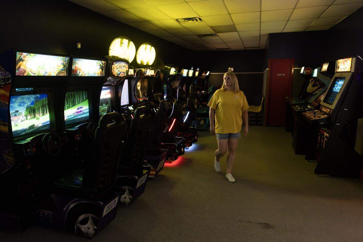 Shannon Bell, the owner of Tornado Terry's, walks through her empty arcade in Keller on Friday, Nov. 14, 2025. A lengthy construction project on Keller Hicks Road has driven away customers that have kept Tornado Terry's open for more 30 years.