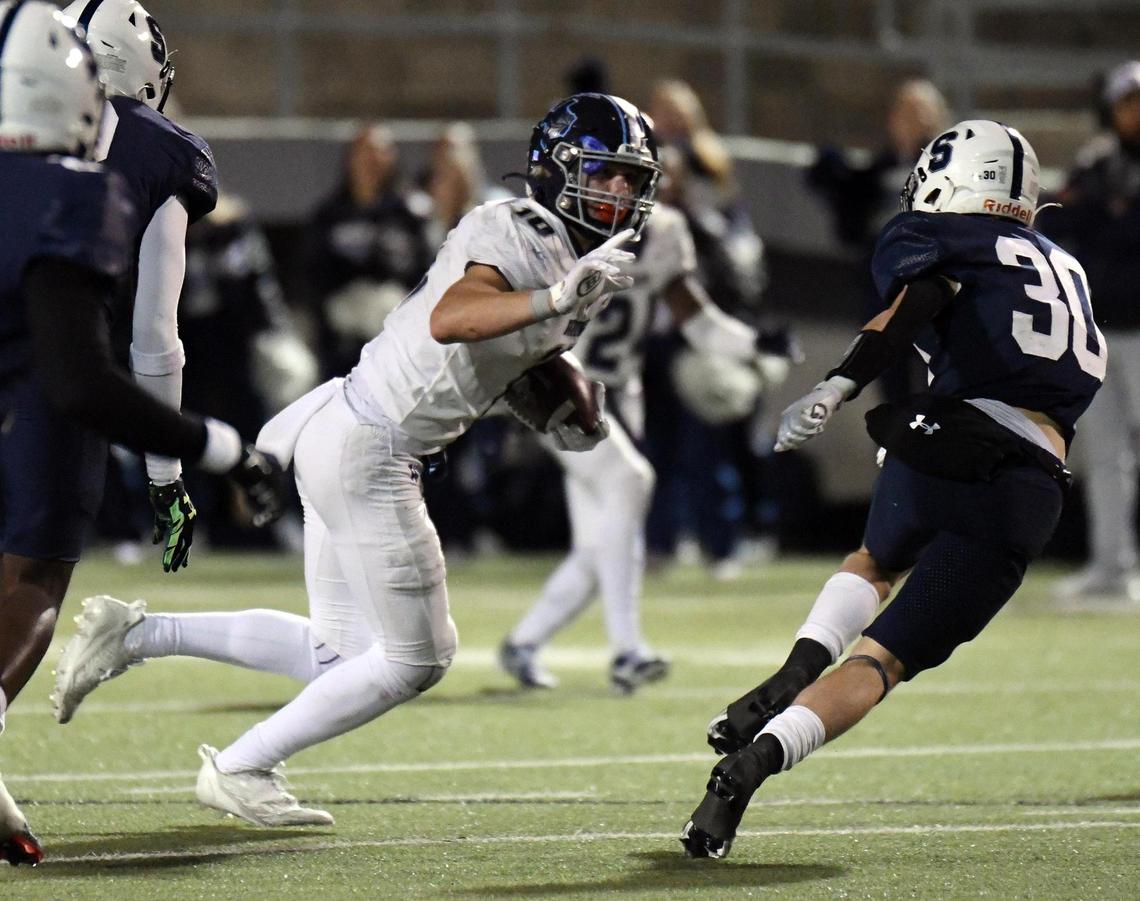Liberty Christian’s Brady Janusek, left, takes a catch and run for a first down as All Saints’s Durham Salter moves to make a stop in the third quarter of Friday’s November 18, 2022 TAPPS Division 2 Regional Championship football game at the Birdville Fine Arts Athletics Complex in North Richland Hills, Texas. Special/Bob Haynes