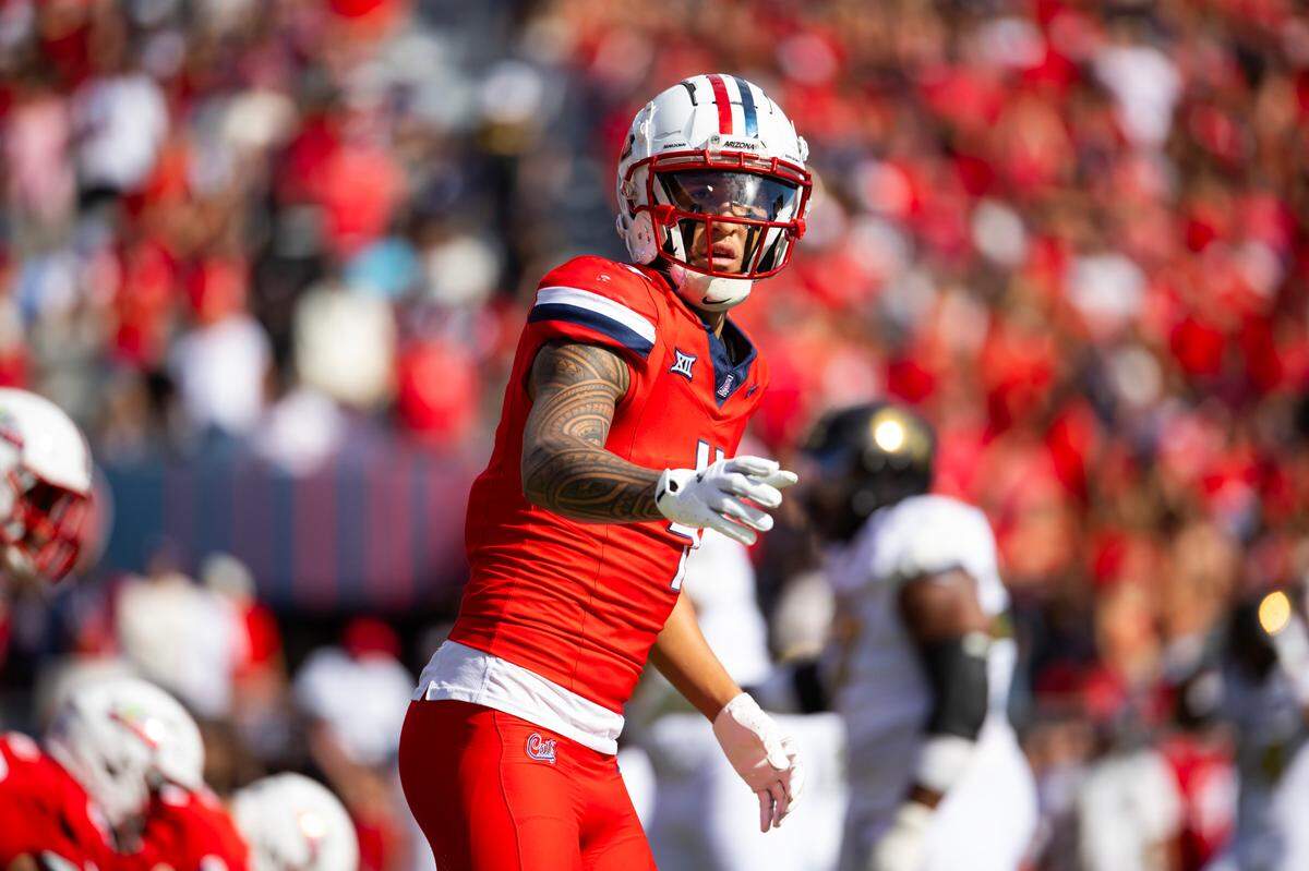 Oct 19, 2024; Tucson, Arizona, USA; Arizona Wildcats wide receiver Tetairoa McMillan (4) against the Colorado Buffalos at Arizona Stadium. Mandatory Credit: Mark J. Rebilas-Imagn Images