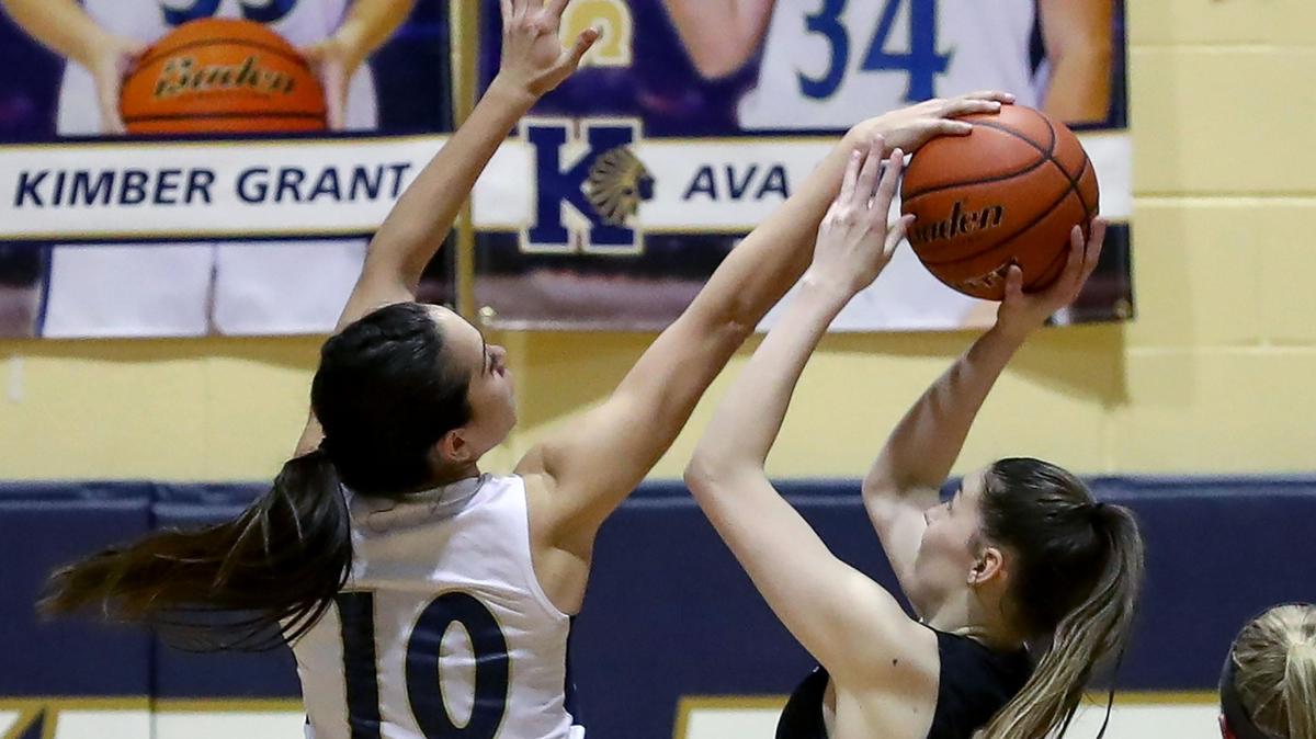 Keller guard Emma Taylor (10) blocks a shot from Denton Guyer forward Morgan Helgesen (20) during the second half, Friday night, January 31, 2020 played at Keller High School.
