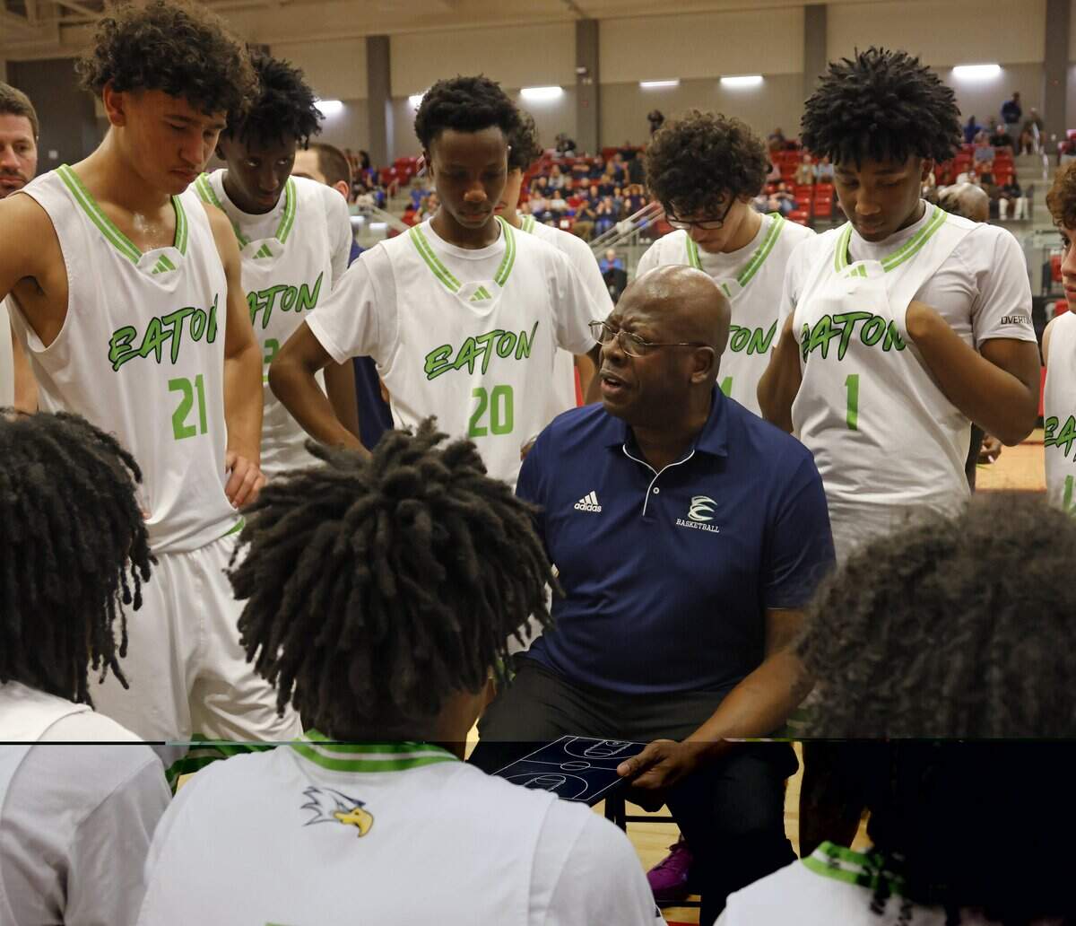 Eaton head coach Tim Thomas talks to the team during a timeout against Allen in the first half of a UIL Class 6A Division I boys regional semifinal basketball game at Coppell High School in Coppell, Texas, Tuesday, March 3, 2026.