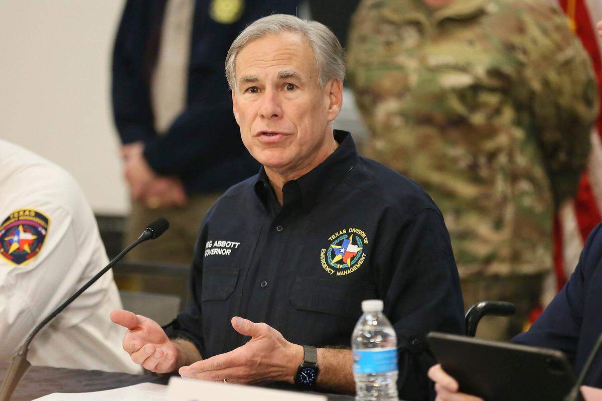 Gov. Greg Abbott holds a press conference about severe winter weather along with representatives from the Texas Division of Emergency Management, ERCOT, at the Alternate State Operations Center, Tuesday, Feb. 1, 2022, in Austin, Texas. (Briana Sanchez/Austin American-Statesman via AP)
