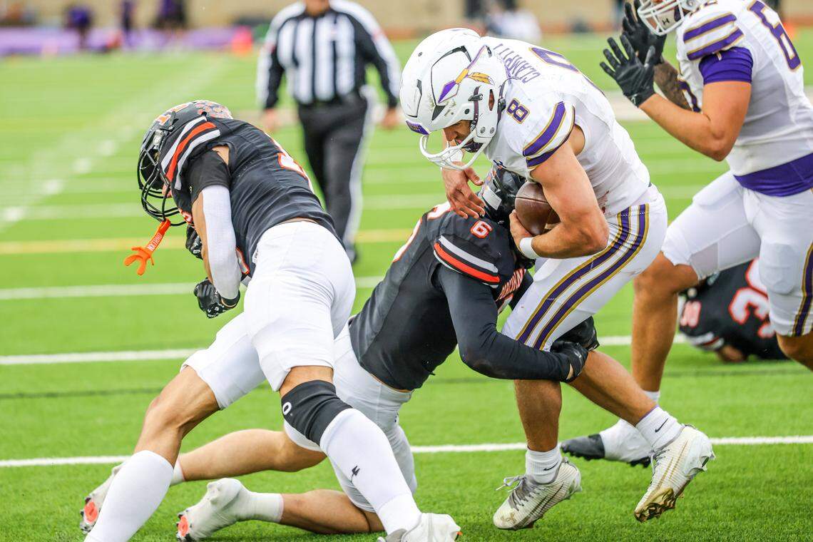 Alvarado running back DJ Clampitt scores a short touchdown past Springtown’s Riley Jackson (6) during a Class 4A Division I regional semifinal Friday, Nov. 28, 2025, at Knight Stadium at Eagle Mountain High School in Fort Worth.