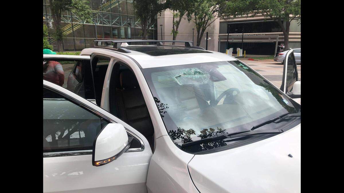 The lawn mower blade sliced through the passenger side of the windshield.