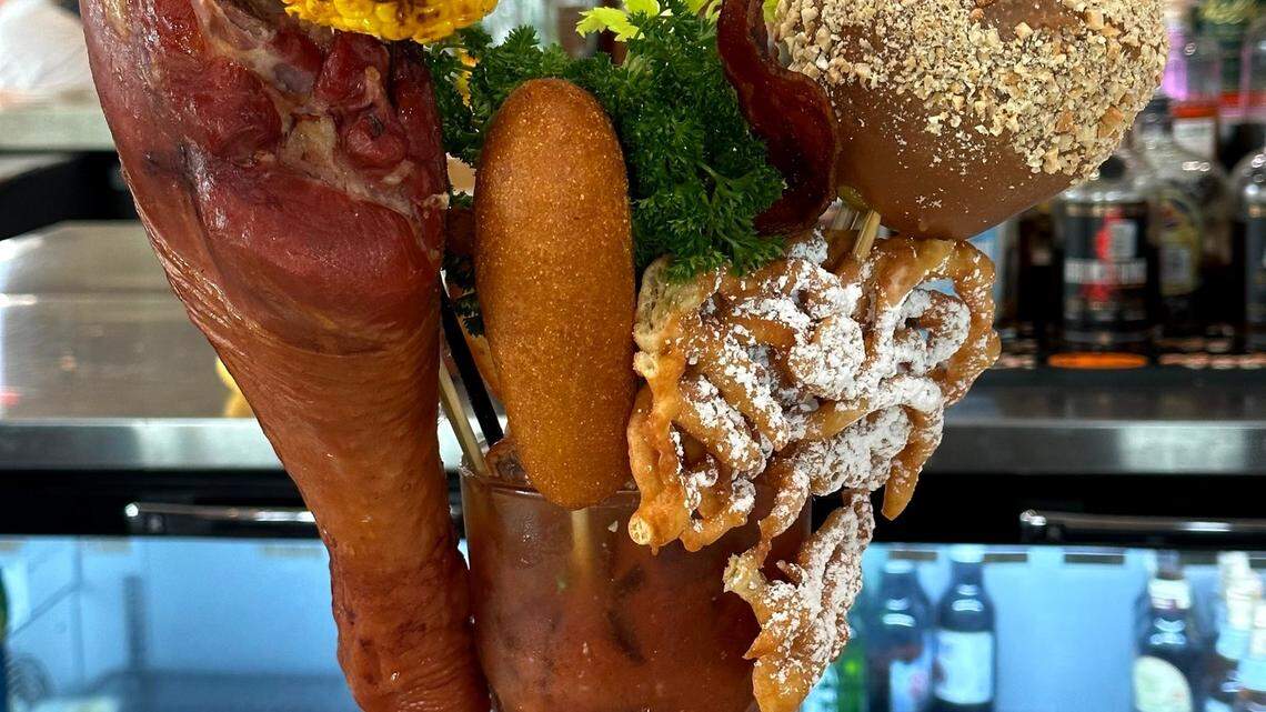 This Texas bloody mary has a turkey leg, corn dog and bacon. Eat your heart out, California