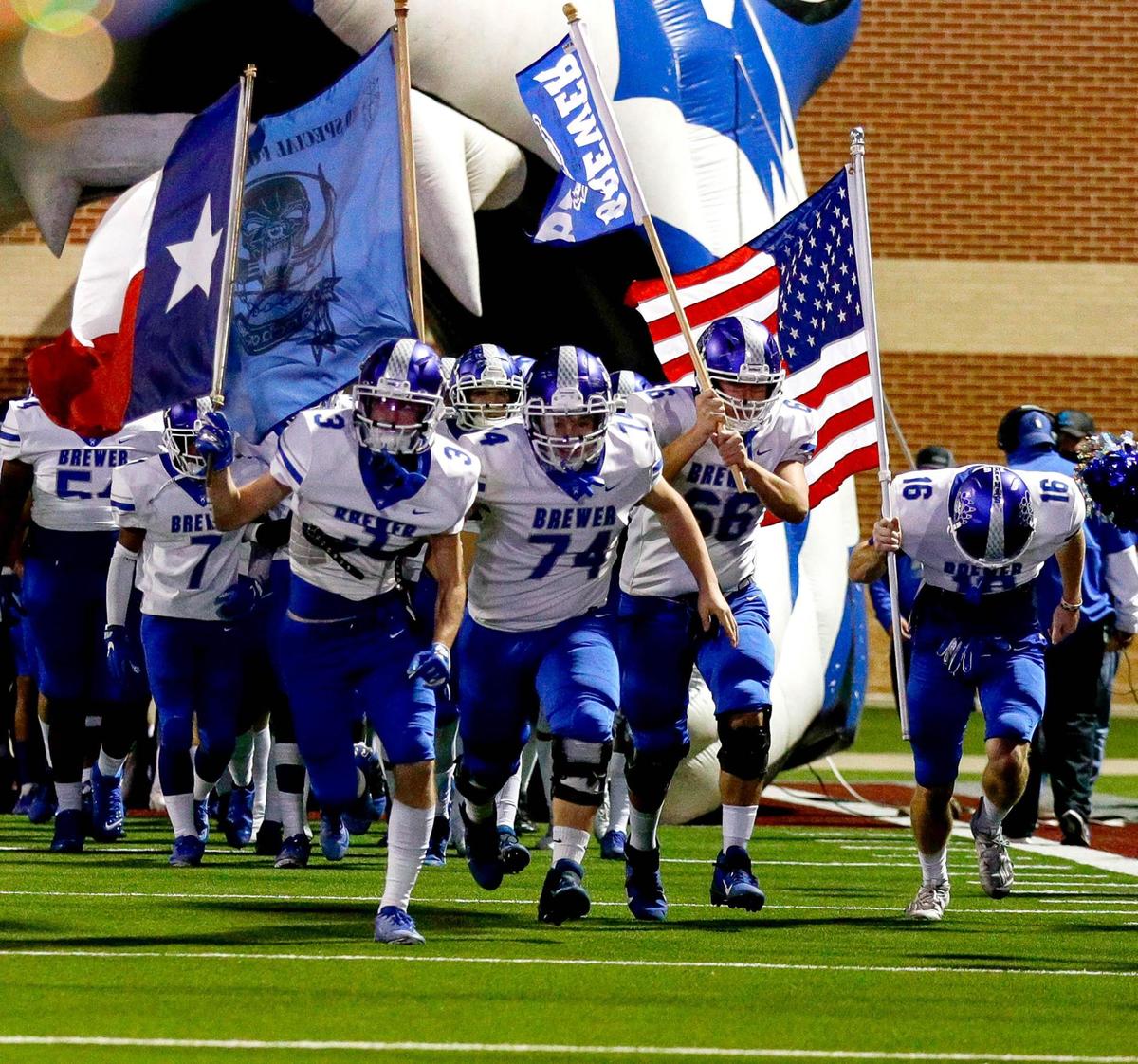 The Brewer Bears enter the field to face Justin Northwest in a high school football game, Thursday night, November 19, 2020 played at Northwest ISD Stadium in Justin, Tx. (Steve Nurenberg Special to the Star-Telegram)
