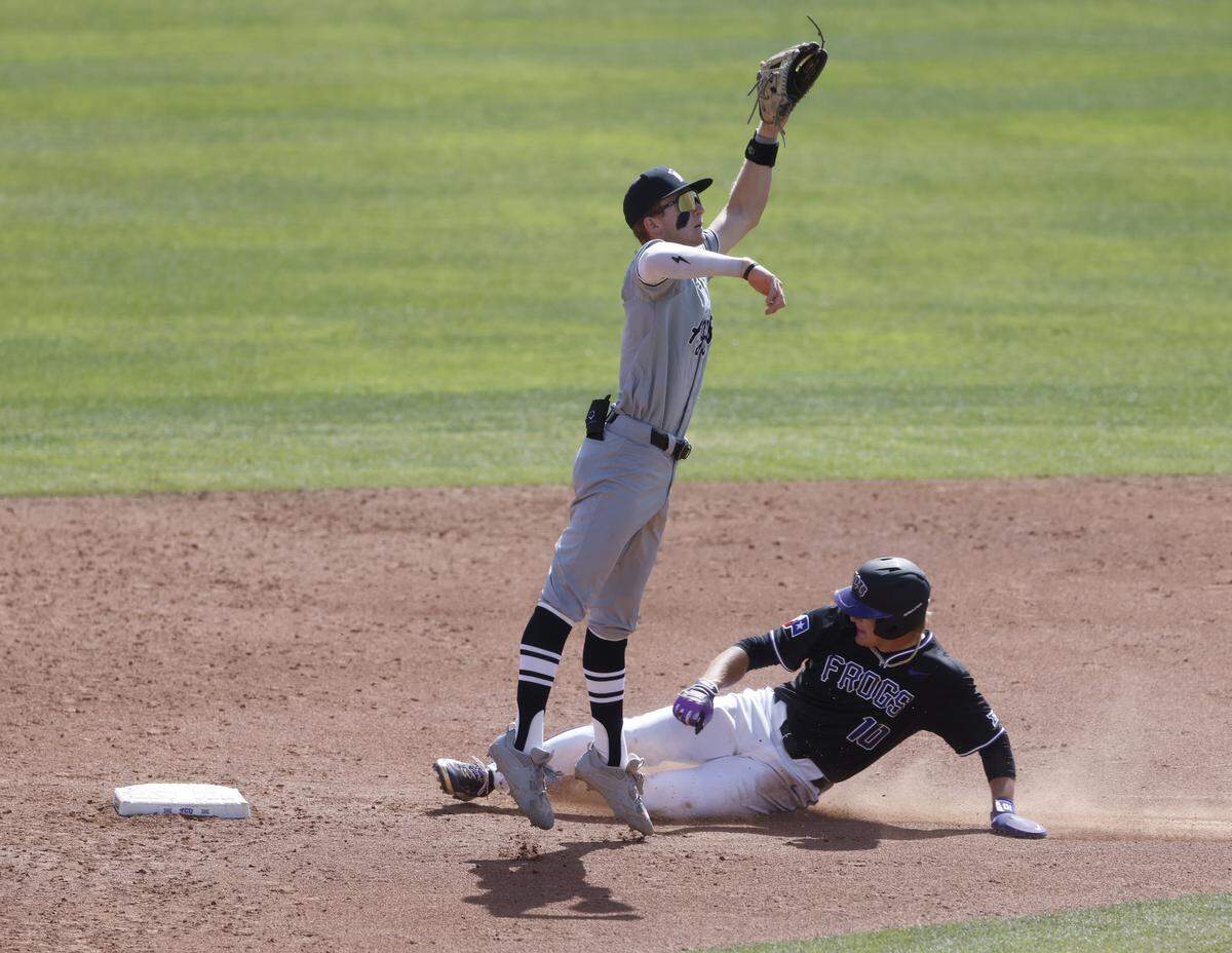 TCU outfielder Sawyer Strosnider (10) steals second and reaches third on an errant throw to New Mexico State second baseman Aidan Lombardi (3) during an NCAA baseball game at Lupton Field at TCU in Fort Worth, Texas, Tuesday, March, 17, 2026.