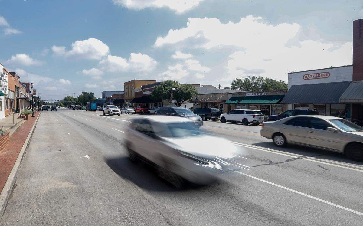Cars drive down the Historic Downtown Mansfield on June 3, 2026. Historic Downtown Mansfield dates back to the 1800s.