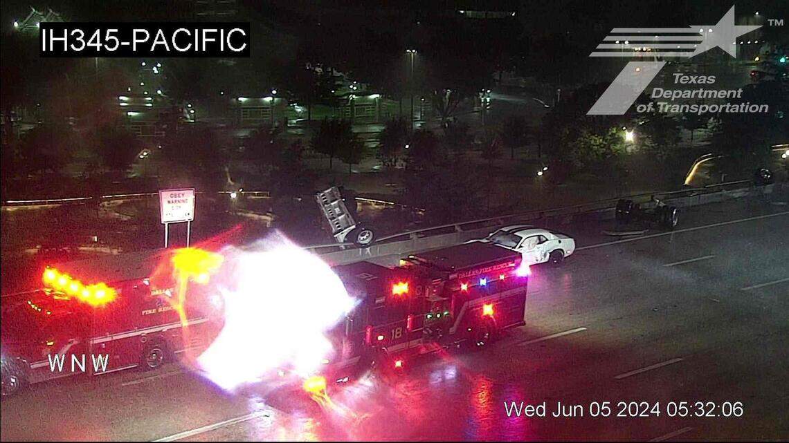 18-wheeler hangs off bridge after crash on downtown Dallas highway, photos & video show