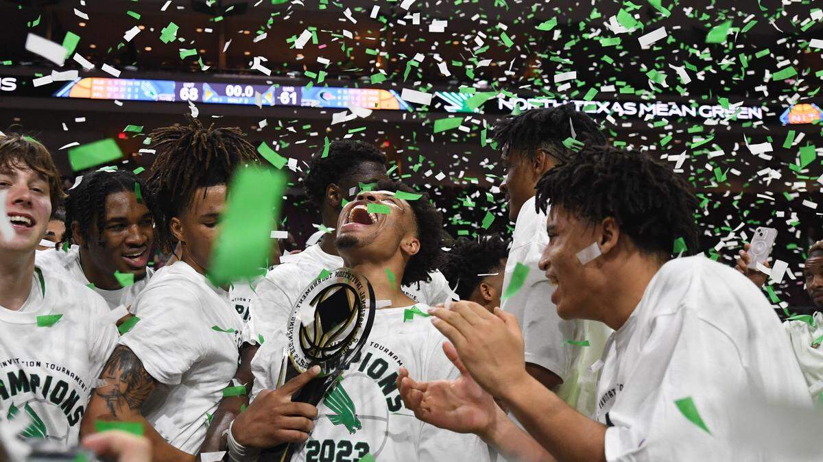 The North Texas Mean Green celebrate defeating the UAB Blazers to win the NIT Championship at Orleans Arena in Las Vegas on Thursday.