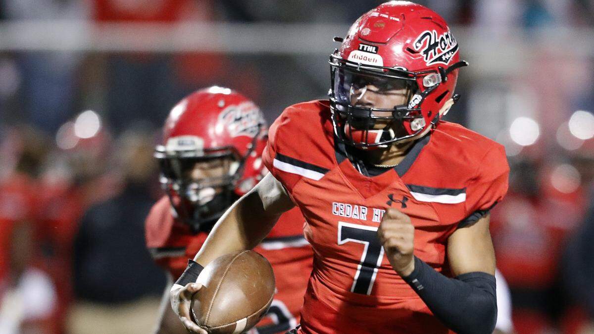 Cedar Hill quarterback Kaidon Salter (7) takes off for long yardage setting up their fourth touchdown during the first half of a game earlier this season against Mansfield Summit. Cedar Hill edged Mansfield Lake Ridge 28-24 on Friday, Oct. 18.