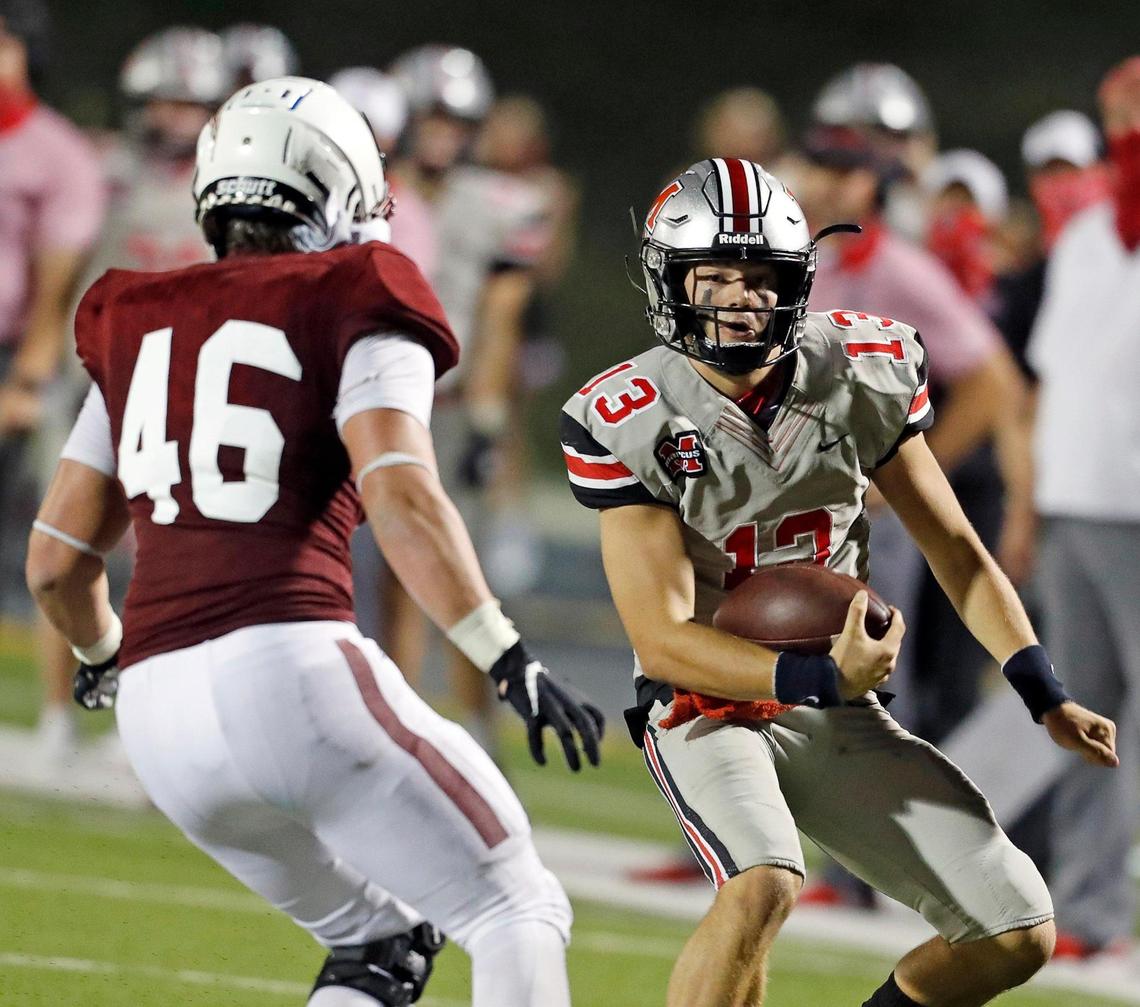 Marcus quarterback Garrett Nussmeier (13) scrambles away from Keller Central defensive end Austin Korbe (46) during a high school football game at Keller ISD Stadium in Keller, Texas, Thursday, Oct. 08, 2020. Keller Central lost their homecoming game to Flower Mound Marcus. (Special to the Star-Telegram Bob Booth)