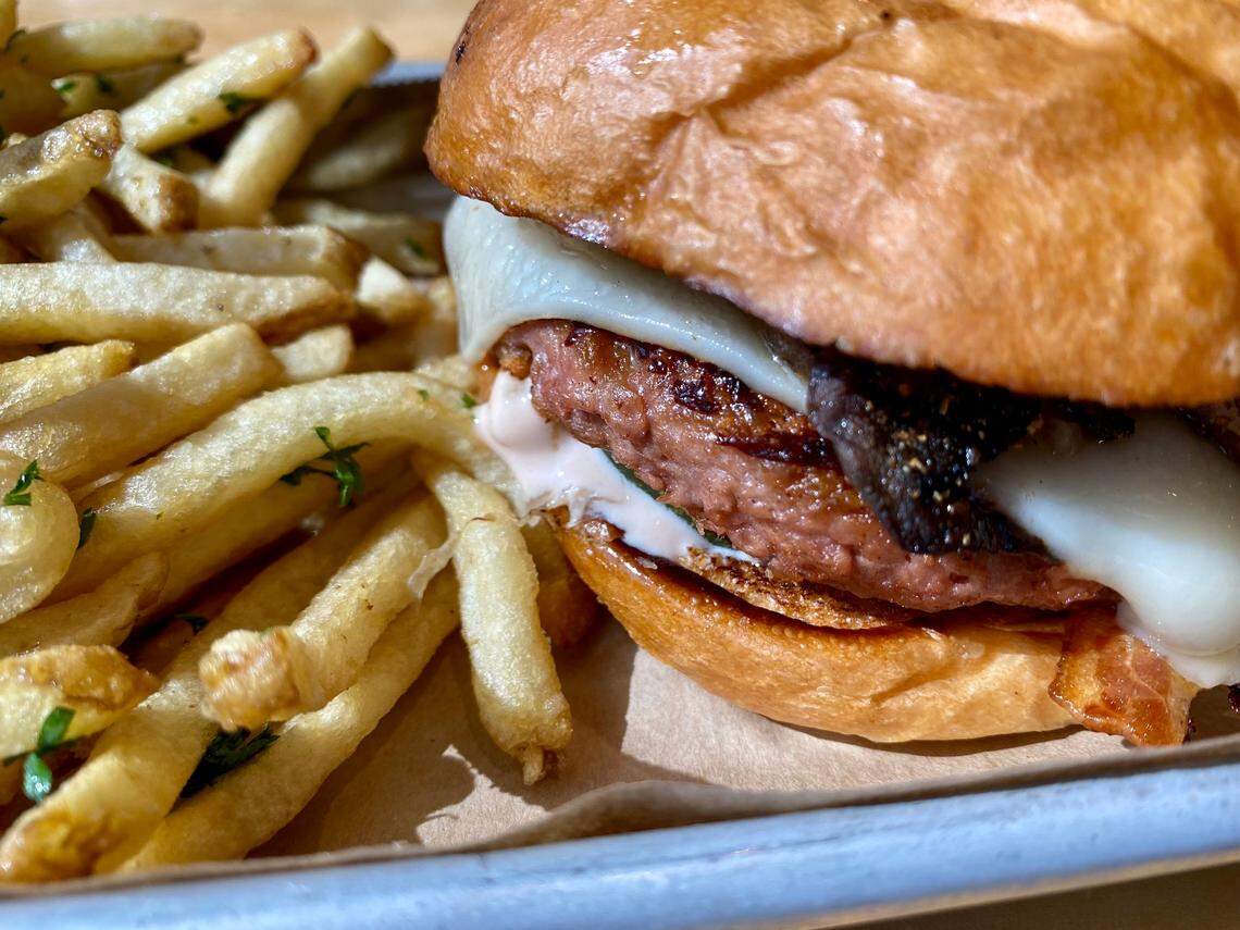 A Hopdoddy Beyond Meat burger with mushrooms and Gruyere.