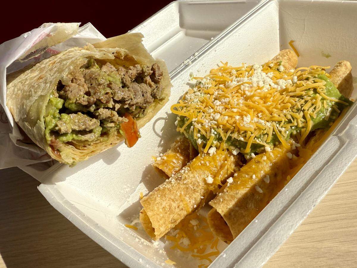 The “original” carne asada burrito, left, with guacamole rolled tacos at Roberto’s Taco Shop of Nevada and California, as see Aug. 15, 2025 at the first North Texas location in Bedford, Texas.