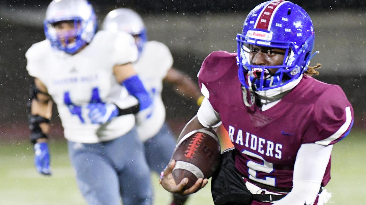 Southwest’s C’ing Blanton, right races up the sideline for a first down ahead of Eastern Hills’ Moises Romero in the first quarter during Thursday’s October 24, 2019 football game at Clark Stadium in Fort Worth, Texas.