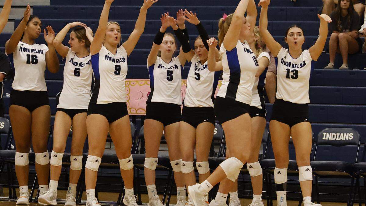 Byron Nelson players celebrate a point during the fourth set against Keller on Oct. 14 at Keller High School. Nelson is the No. 1-ranked high school volleyball team in the country.