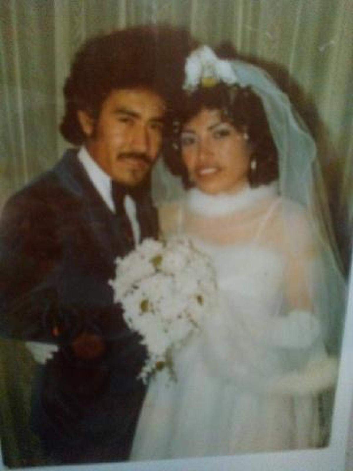 Jose Adalberto Cruz Hurtado (left) poses for a photo with his bride, Maria Carmen Cruz (right). The longtime TCU employee, who was raised in Mexico, moved to Fort Worth after he married to be close to her family.