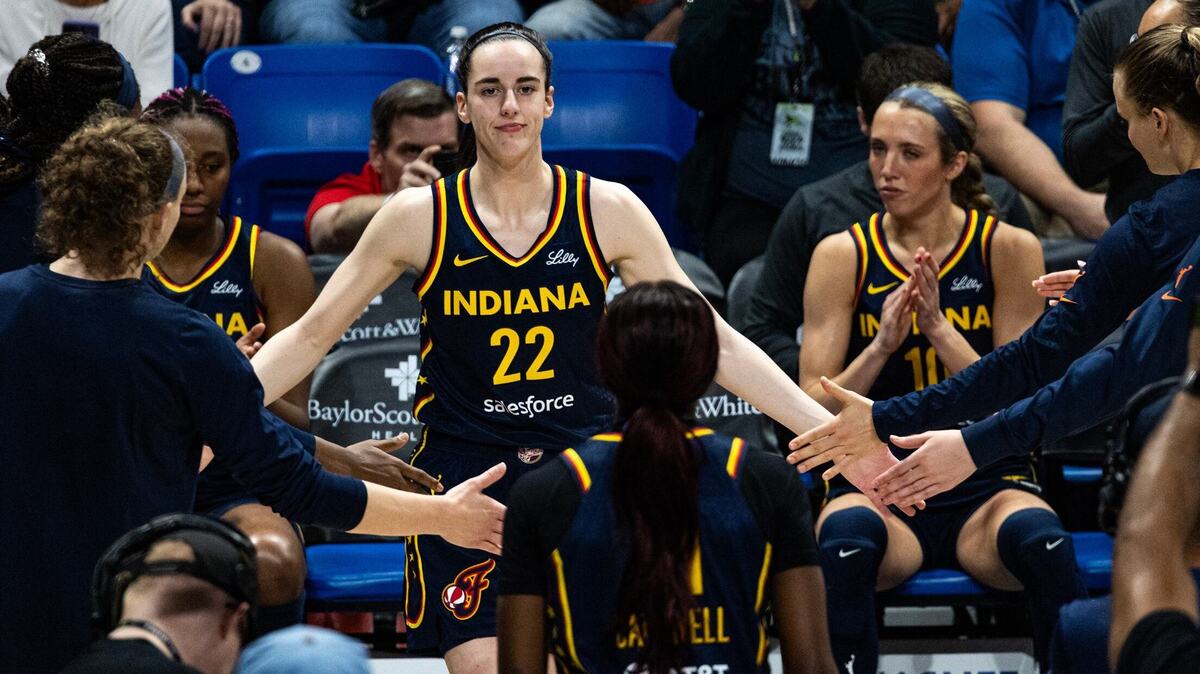 Indiana Fever guard Caitlin Clark (22) is announced as a starter prior to a WNBA preseason game against the Dallas Wings at College Park Center in Arlington on May 3, 2024. A North Texas man accused of stalking Clark was recently arrested in Indianapolis.