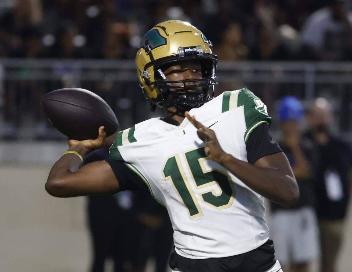 DeSoto quarterback LeMarcus Summers (15) completes a long pass down field during the first half of a UIL football game between DeSoto and North Crowley at Crowley ISD Multi-Purpose Stadium in Fort Worth, Texas, Friday, Sept. 05, 2025.