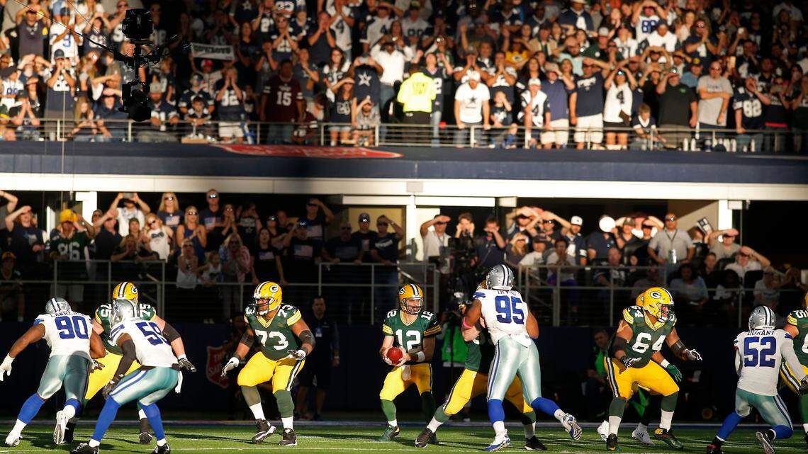 Green Bay Packers quarterback Aaron Rodgers (12) takes a snap against the Dallas Cowboys in the second half of an NFL football game at AT&T Stadium in Arlington, Texas on Sunday, Oct. 8, 2017. Green Bay won 35-31.