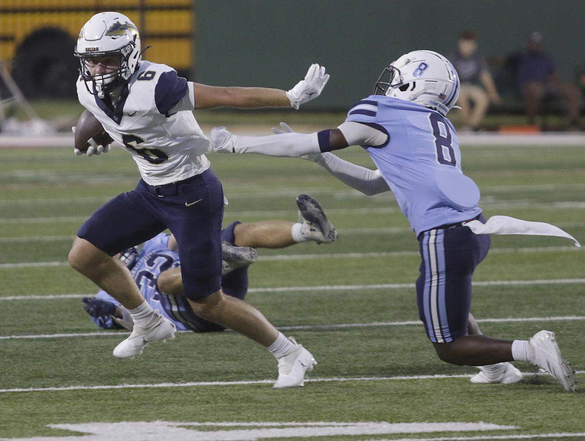 Keller’s Bodie Davis breaks a tackle  against  L.D. Bell during their game at Pennington Field on Friday, Sep. 19, 2025 