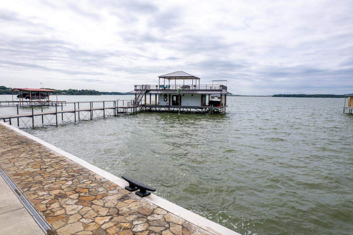 A 13 foot deep water dock at 9930 Boat Club Road, the only dock like it in all of Eagle Mountain Lake.