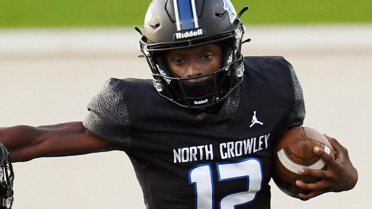 North Crowley QB Chris Jimerson (right) had a big night as the Panthers beat Weatherford.