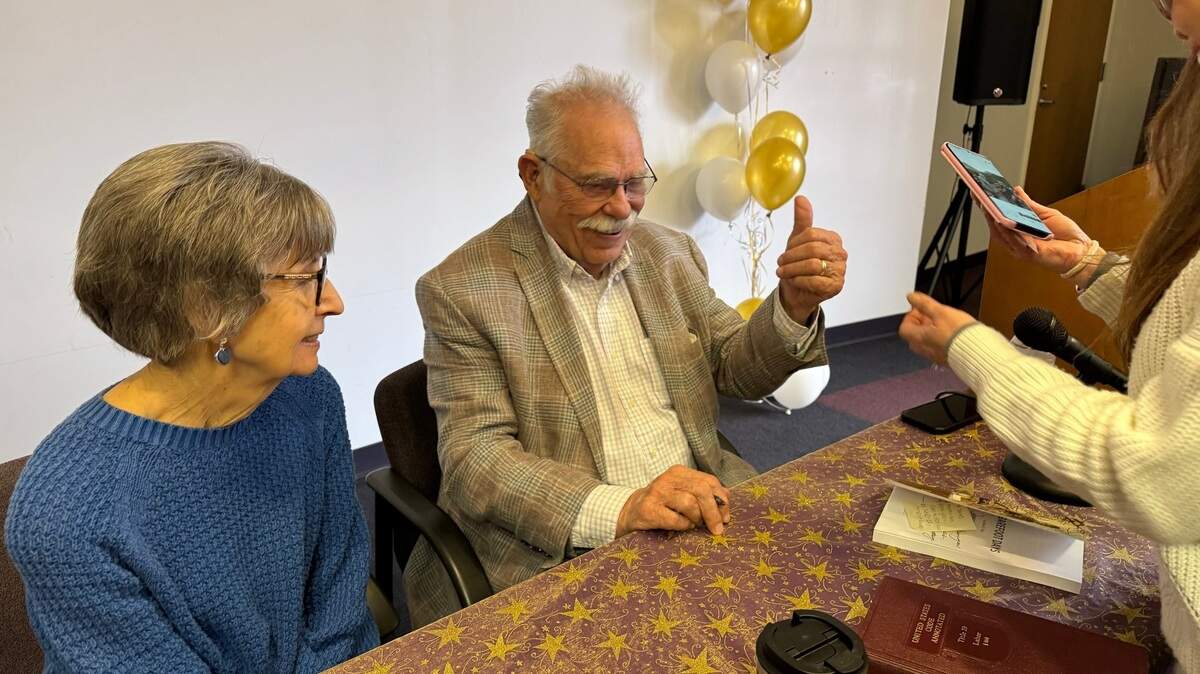 Grapevine Mayor William D. Tate and his wife Betty during a recent signing for his book “My Barefoot Days.”