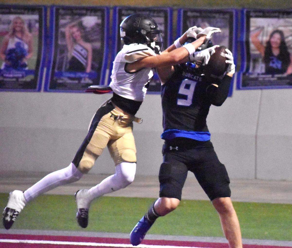 Byron Nelson’s Pierce Dahlin catches a touchdown pass while being covered by Fossil Ridge’s Logan Taylor during Thursday’s game in Justin.