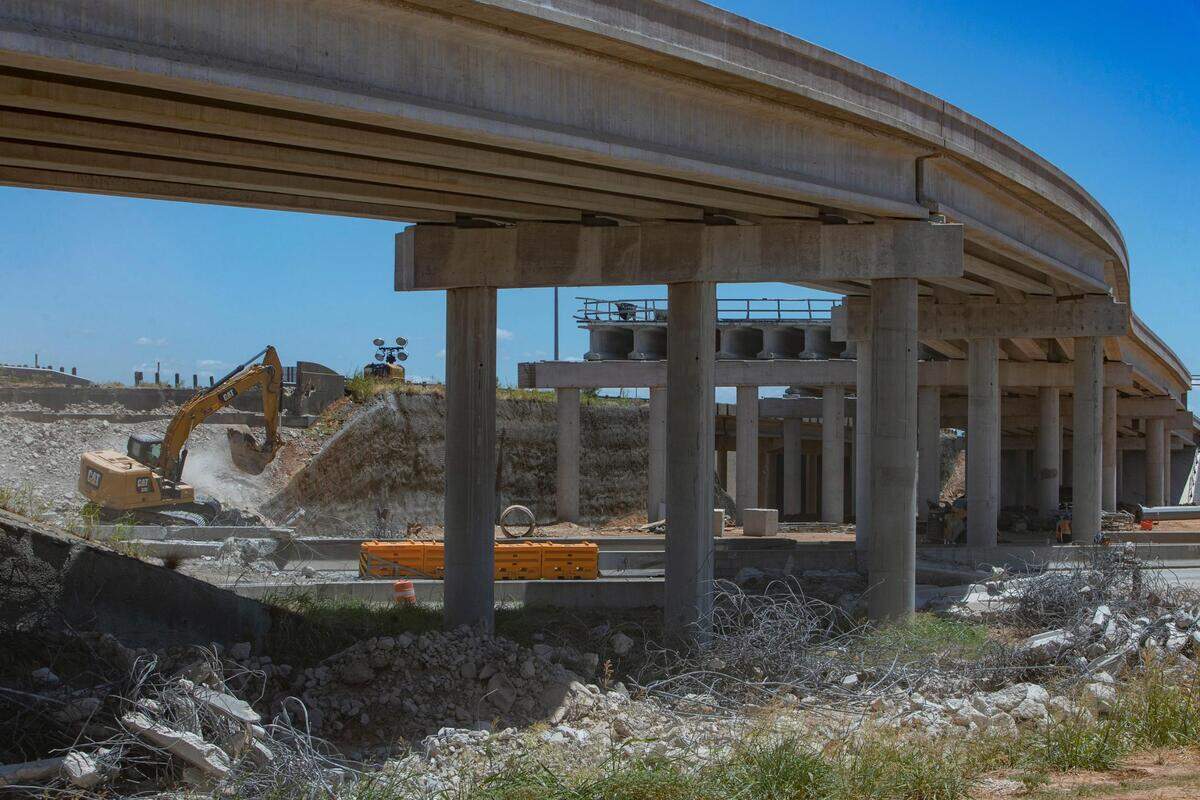 Demolition begins for the southbound Loop 820 bridge crossing over Texas 121 in Fort Worth, Texas, on Saturday, July 16, 2022. Multiple detours bypassed motorists around the ongoing construction.