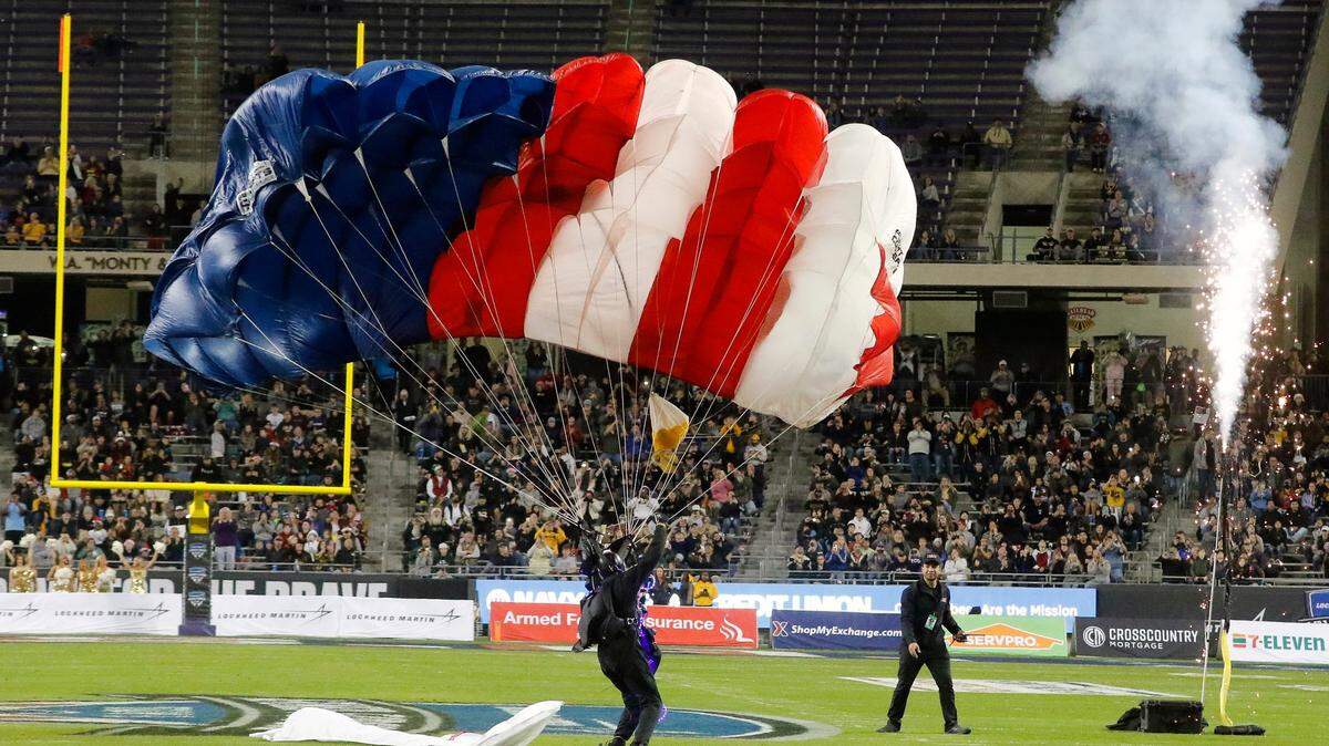 The All Veteran Parachute team dropped in before the first half of the Lockheed Martin Armed Forces Bowl at Amon G. Carter Stadium on Dec. 22, 2022.