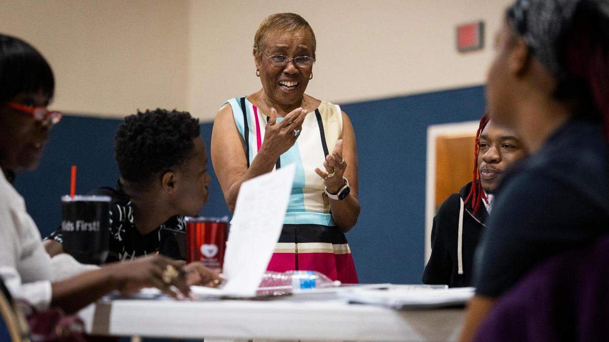 Trudy Darden, curriculum developer, talks to trainees prepping to teach students reading at summer camp Thursday, June 9, 2022, at Ebenezer Baptist Church in Fort Worth.