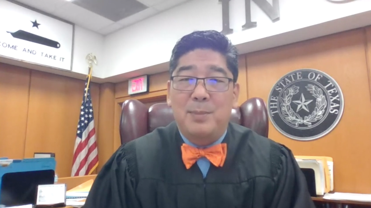 A screenshot of Judge Alex Kim addressing YouTube viewers from inside his courtroom.