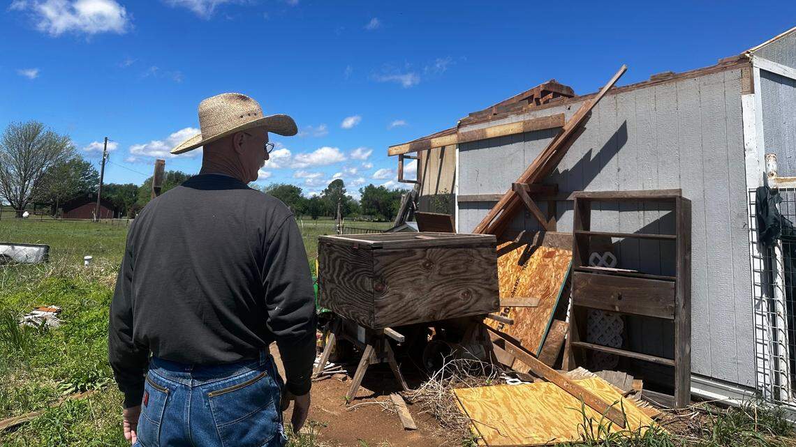 Jim Long surveys damage to his home from one of the possible tornadoes that hit Parker County on Saturday, April 19, 2025.