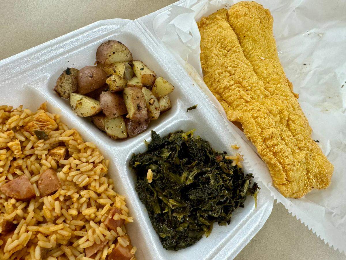 Fried catfish, jambalaya, greens and Cajun spiced potatoes at Always Cooking NOLA in River Oaks, shown June 1, 2024.