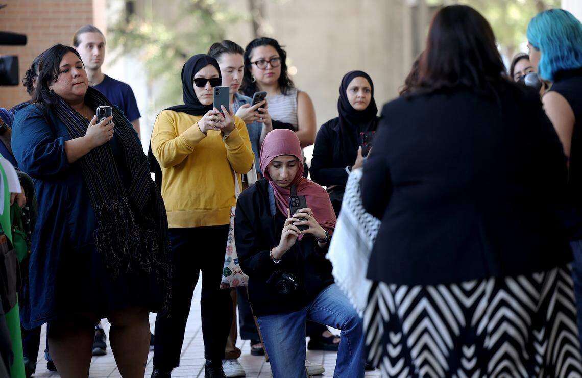 Supporters of defendants Raunaq Alam, Afsheen Khan hold a press conference on Monday, Sept. 8, 2025, outside the Tim Curry Criminal Justice Center in Fort Worth. The pro-Palestine protesters initially faced misdemeanor graffiti charges but prosecutors upgraded their cases to third-degree felonies under Texas hate-crime law.