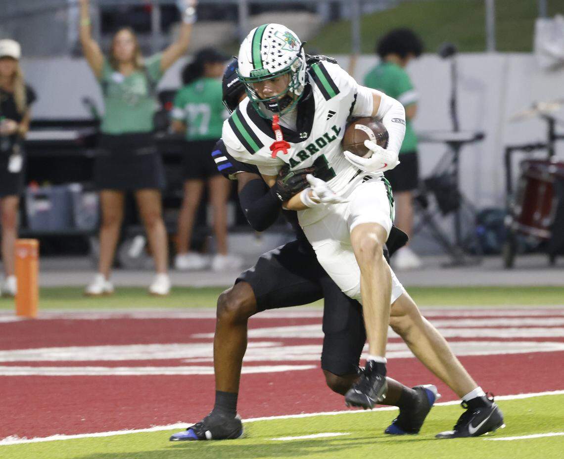 Southlake wide receiver Brock Boyd (1) scores after the catch during the first half of a UIL football game between Southlake Carroll  and Byron Nelson at Northwest ISD Stadium in Justin, Texas, Friday, Sept. 12, 2025.