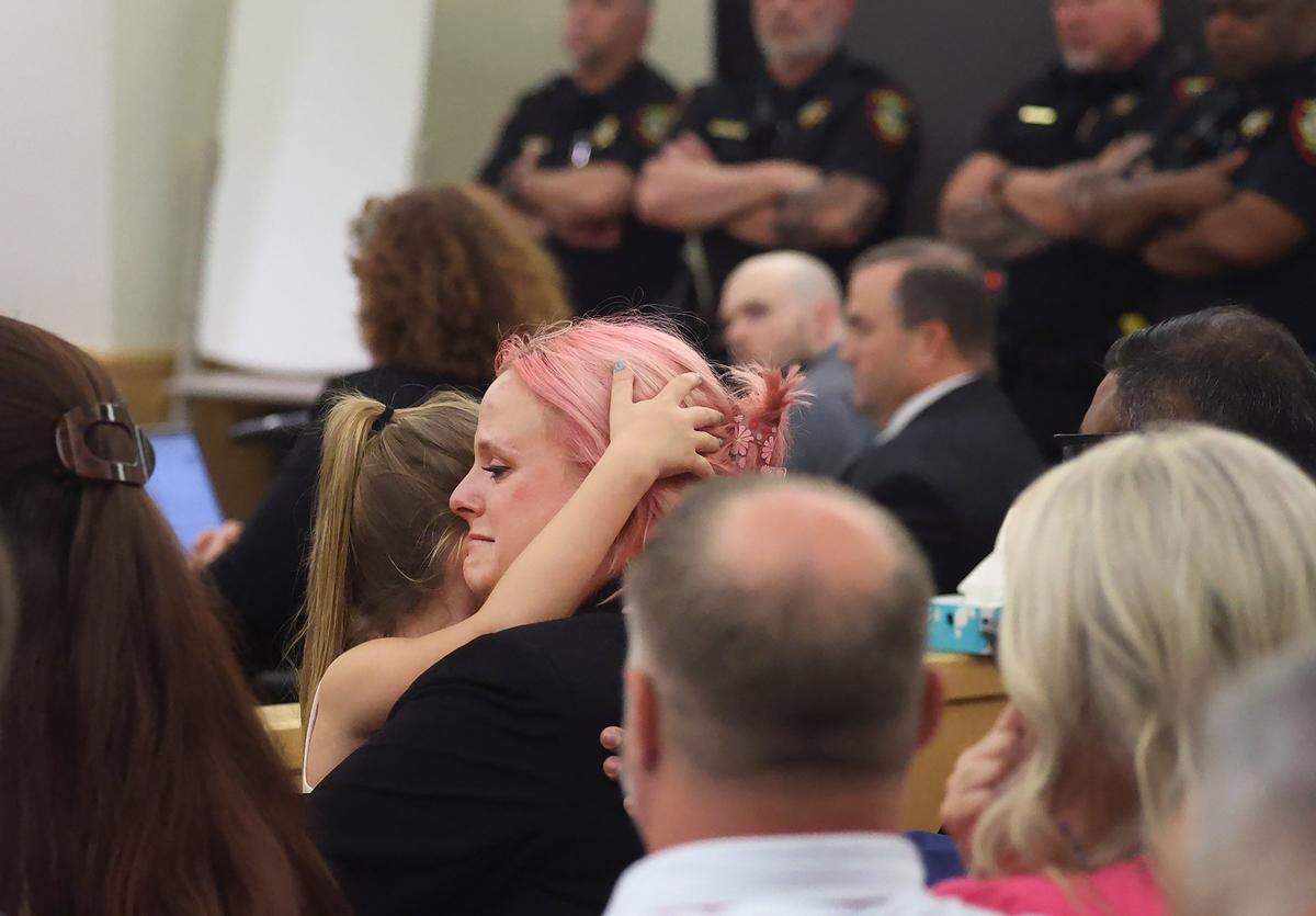 Athena Strand's mother Maitlyn Gandy, center, cries while holding her youngest daughter after the jury sentenced Tanner Horner to the death penalty on Tuesday, May 5, 2026, at the Tim Curry Criminal Justice Center in Fort Worth.