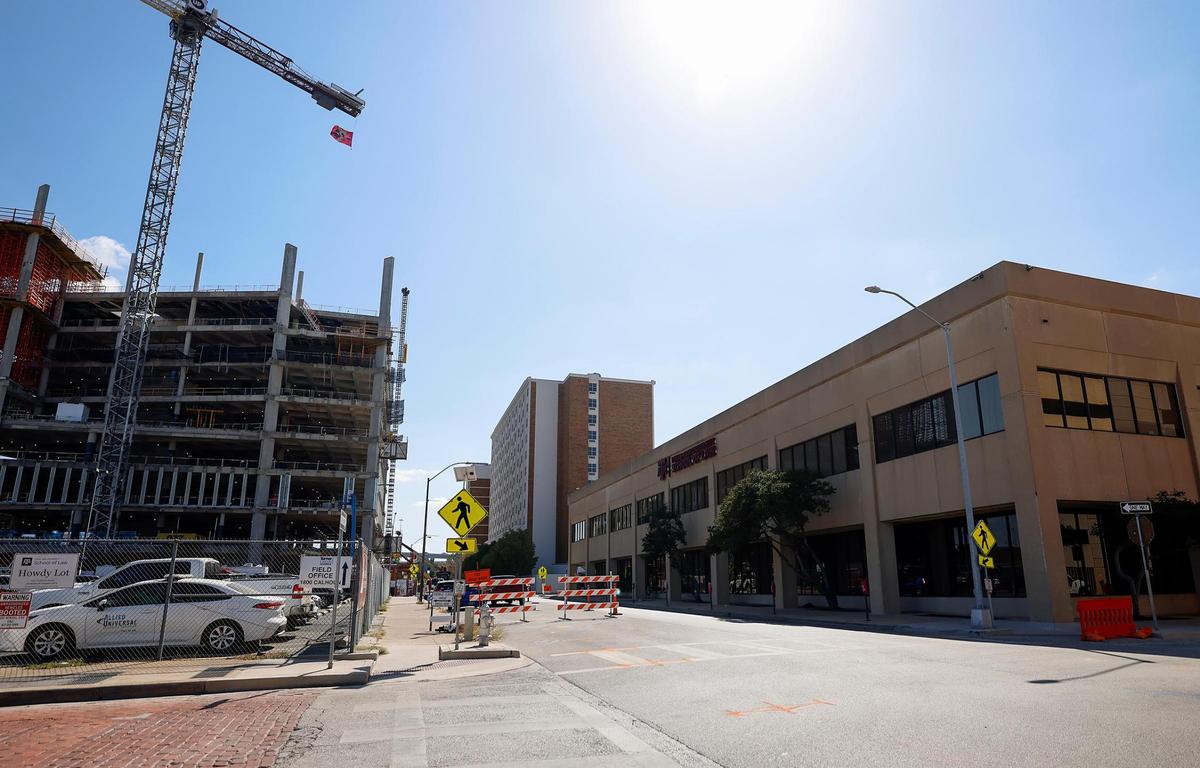 The current Texas A&M School of Law building, right, on Calhoun Street in downtown Fort Worth on Tuesday, Oct. 22, 2024.