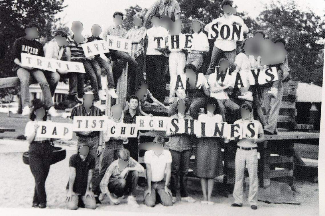 John Finley, former Travis Avenue Baptist Church youth minister, center, is pictured with members of the youth group. Faces of the other members have been blurred to protect their identities.