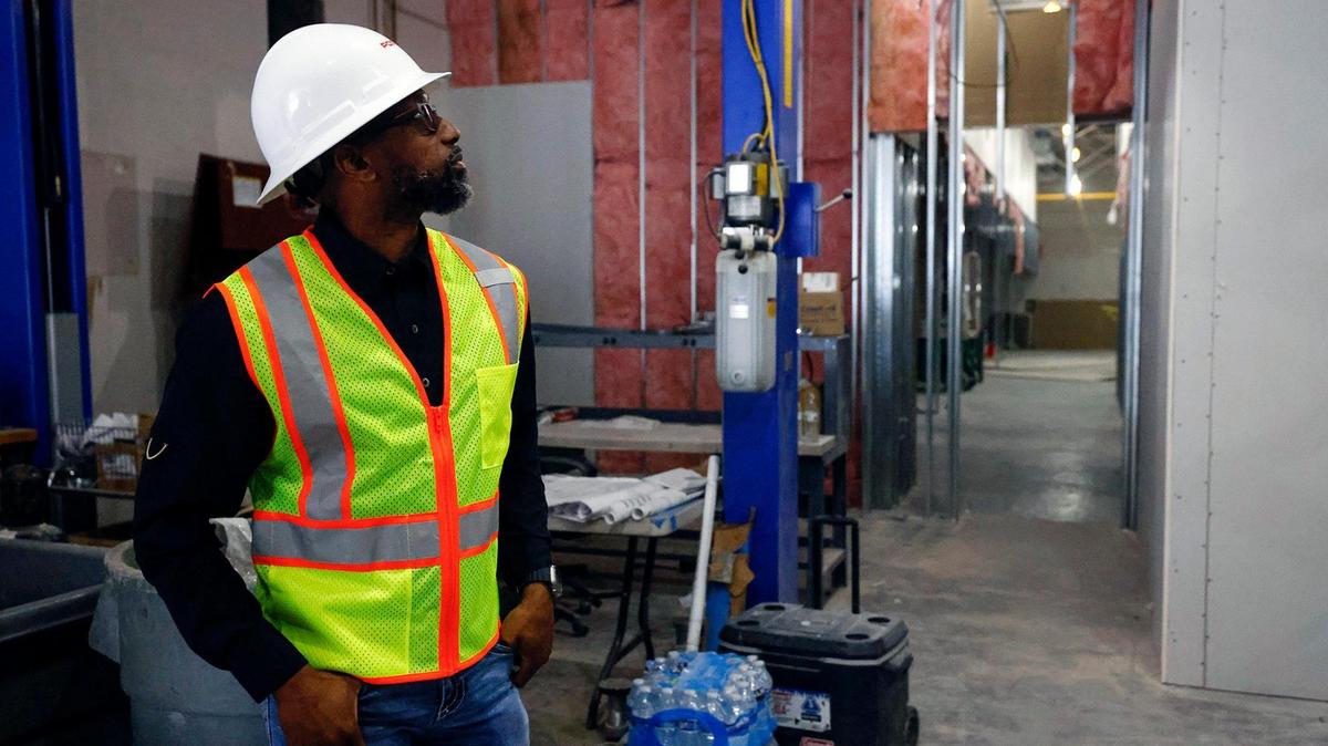 Jeff Postel tours one of his copmany’s construction sites at the UNT Health Science Center in November. Postel is the founder of Post L Group, a Black-owned construction management company.