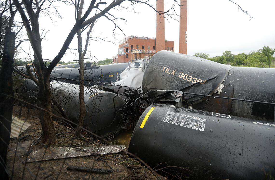 Homes were evacuated early Wednesday in several Fort Worth neighborhoods when train cars caught fire after derailing, fire officials said. The Union Pacific train derailed west of the intersection of Riverside and East Berry.