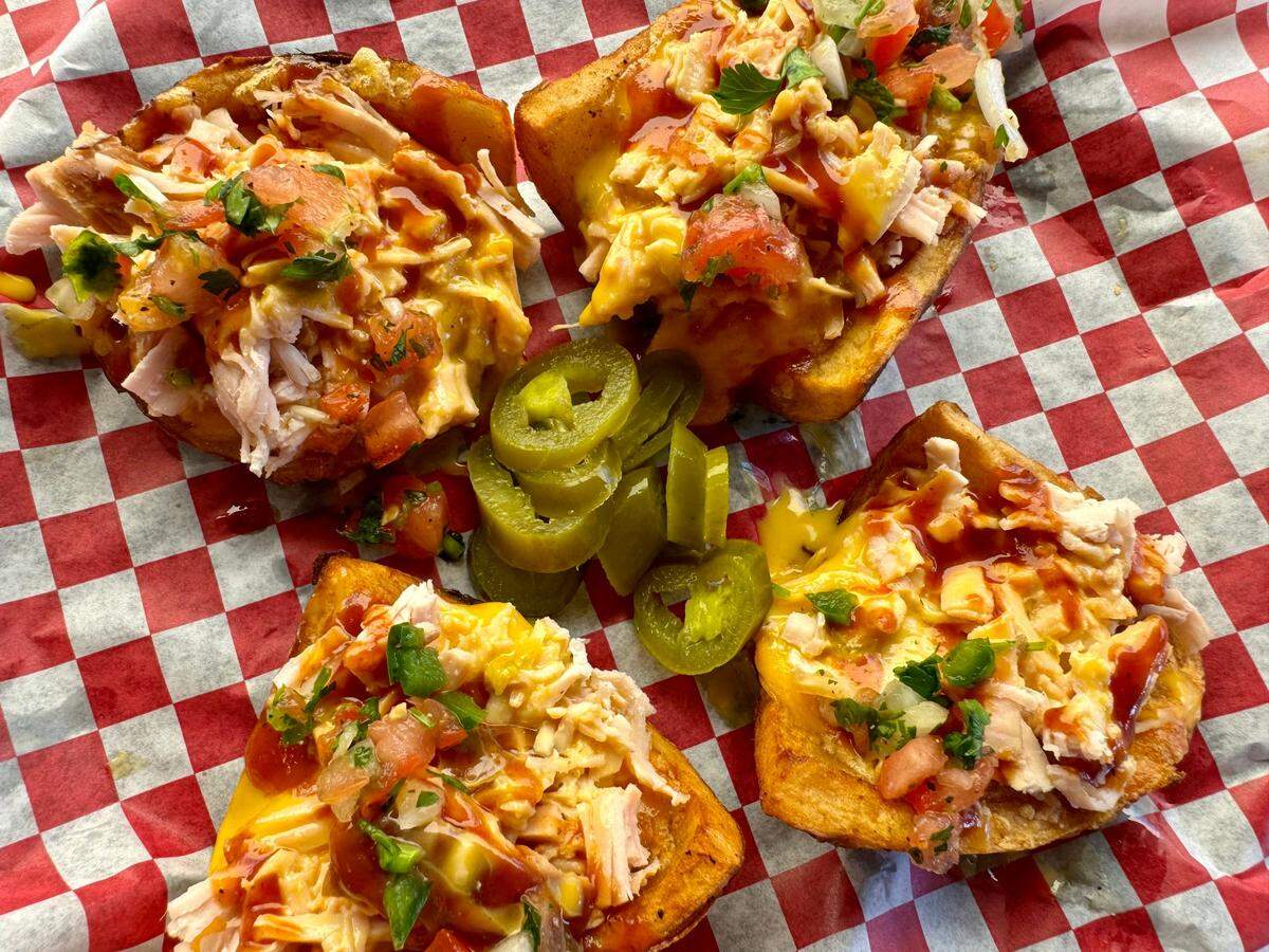 Potato skins with smoked turkey, queso, barbecue sauce and pico de gallo at Dead End Trading Post west of Fort Woth, seen September 15, 2024.