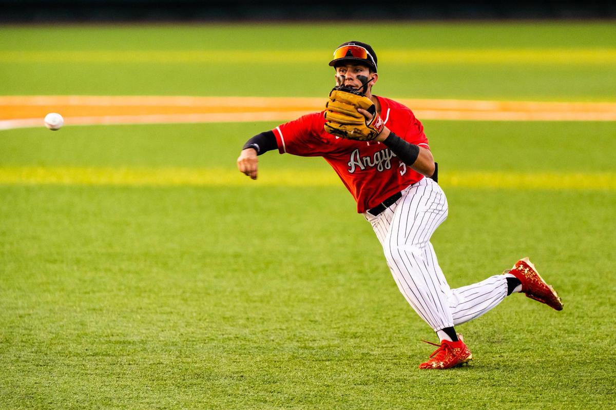 Colton Roquemore makes a throw to first during the 4A UIL baseball state final between Argyle and Sinton at on June 09, 2022.